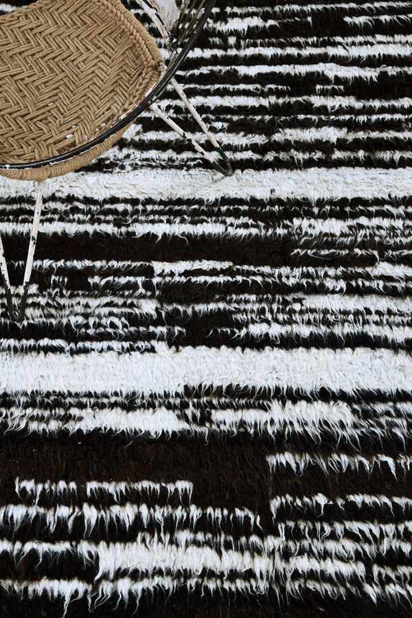 Broussard II, Atlas Collection, Ivory Black - styled in room setting