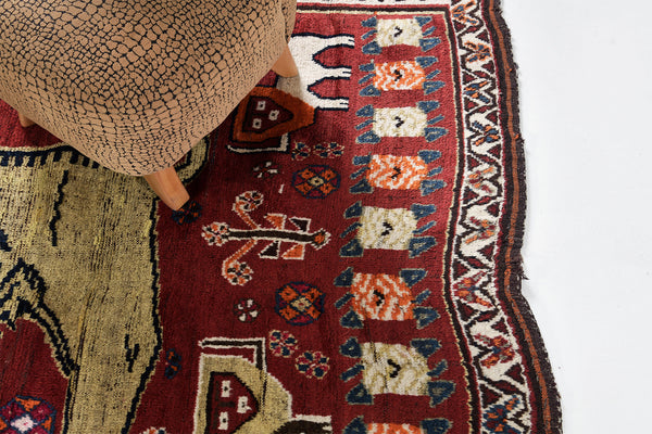 Antique Persian Ghashghaei "Lion Rug" - styled in room setting