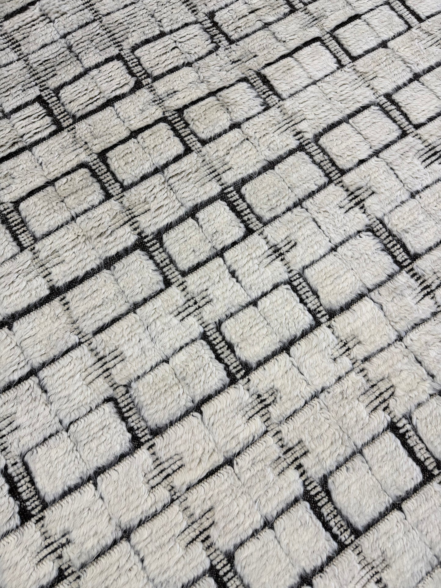 Ibis, Sandpiper Collection, Ivory Black - close-up of weave texture and pile