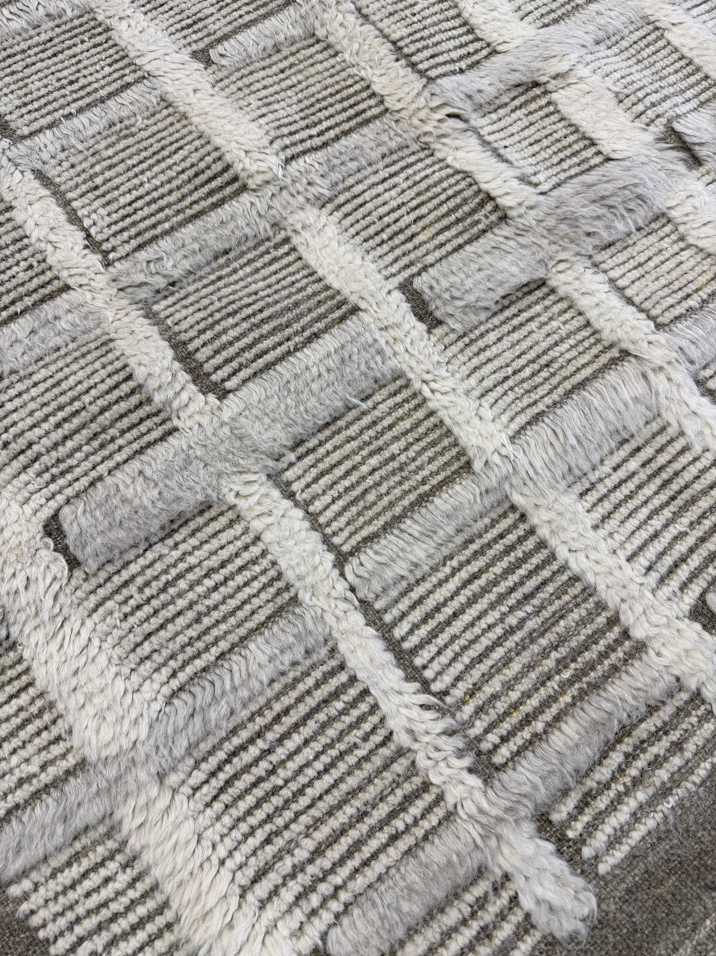 Stork, Sandpiper Collection, White Sand - close-up of weave texture and pile