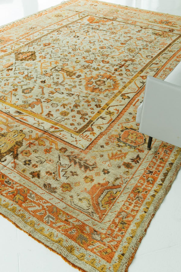 Antique Turkish Oushak Rug - hand-knotted in Turkey - styled in room setting [#8]